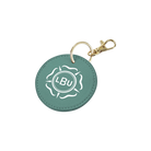 Green round keychain with 'LBU' logo on a white background