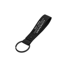 Black keychain with 'Leeds Beckett University' text on a white background